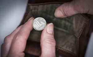 Russian 1 Ruble Coin And an Empty Purse.